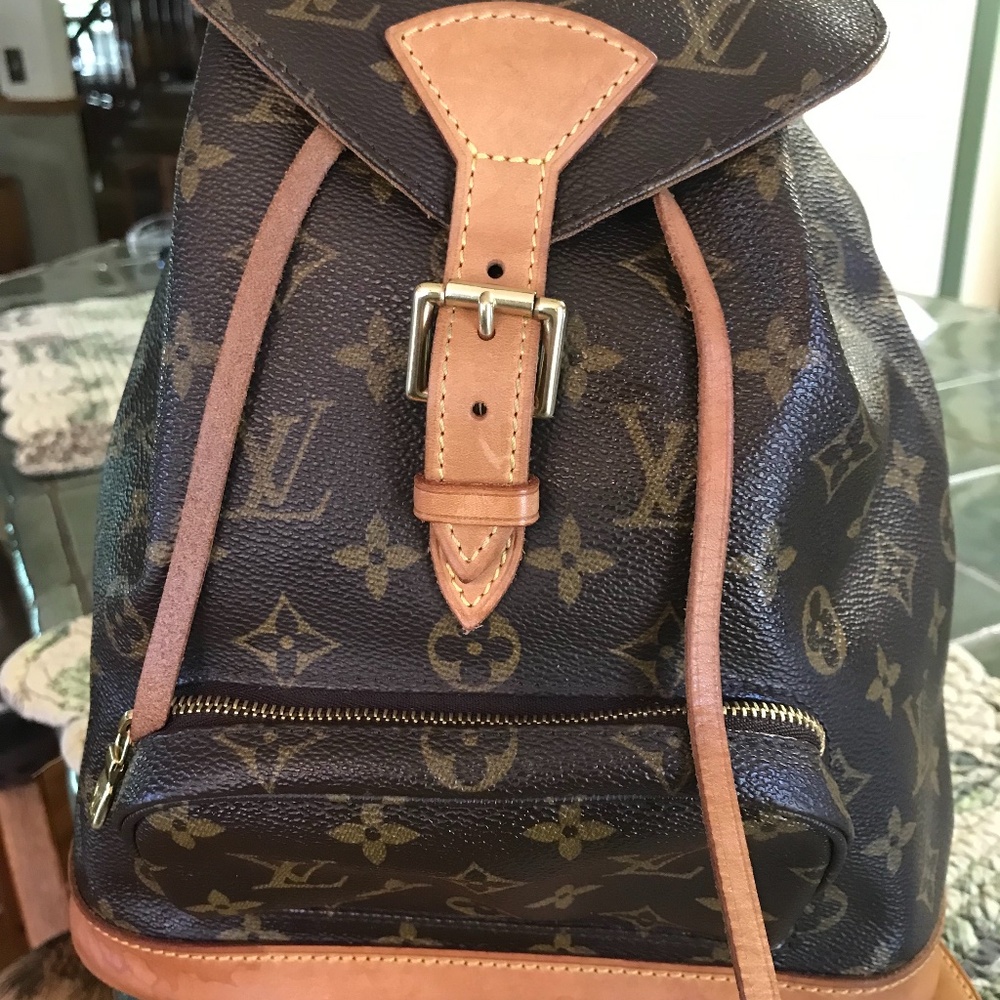 Louis Vuitton Backpack purse w/receipt & dustbag